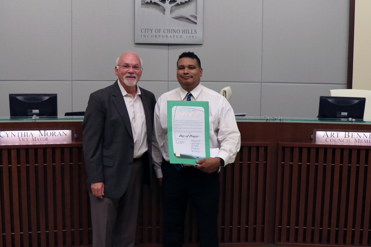 Photo of Pastor accepting National Day of Prayer proclamation